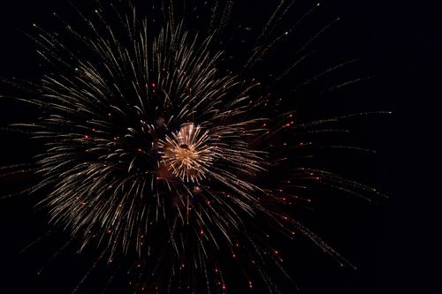 Free Bright fireworks illuminating the night sky with a spectacular burst of colors and patterns. Stock Photo