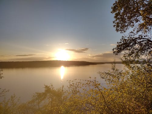 Gratis stockfoto met gouden zonsondergang, horizon over water, zonsondergang