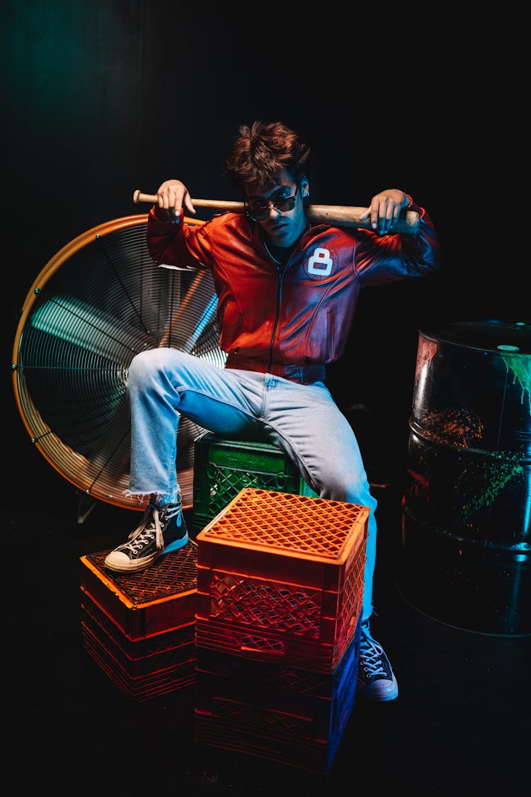 Man In Jacket With Baseball Club