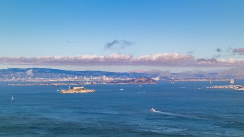 Free Stunning aerial shot of Alcatraz Island with San Francisco skyline and Golden Gate Bridge in background. Stock Photo