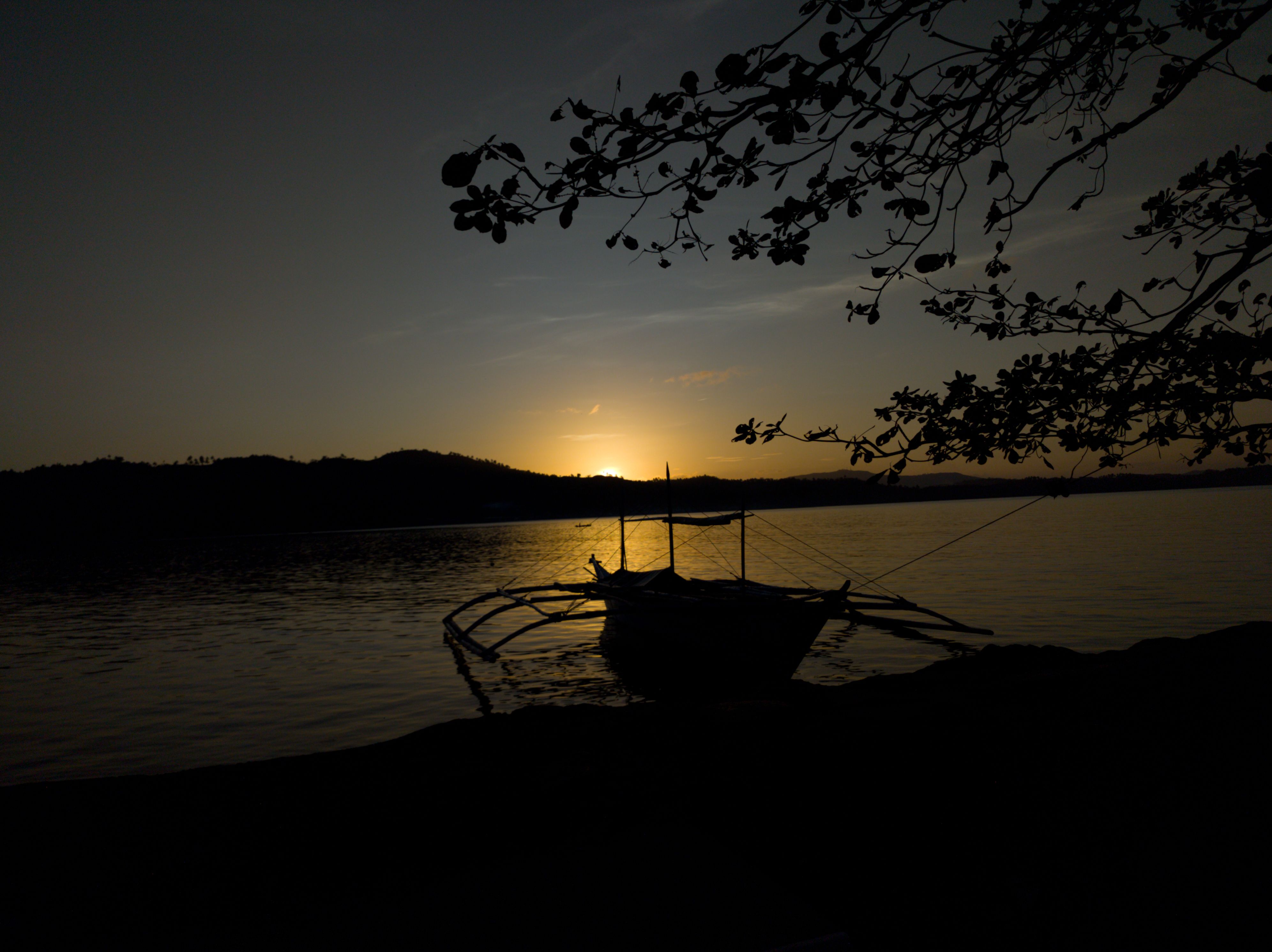 Silhouette of Boat on Sea during Sunset · Free Stock Photo