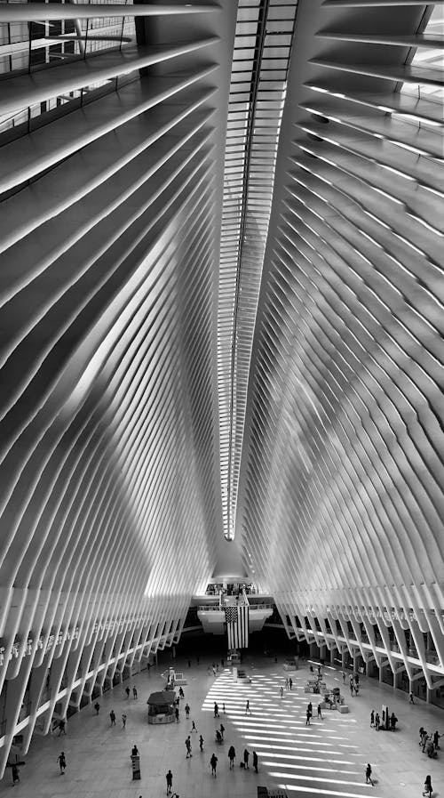 Grayscale Photo of People inside World Trade Center Transportation Hub