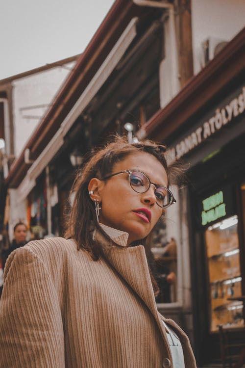 A Woman in Brown Framed Eyeglasses