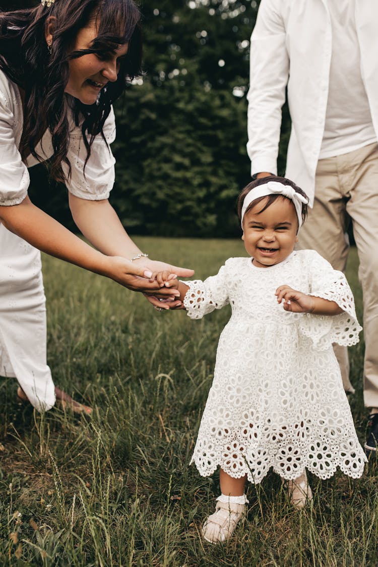 A Girl With Her Parents