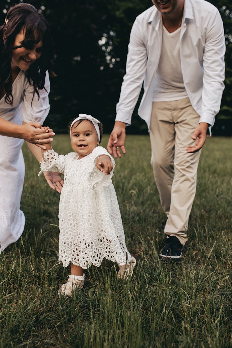 Parents With Their Daughter