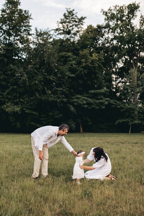 Parents with their Daughter in a Field