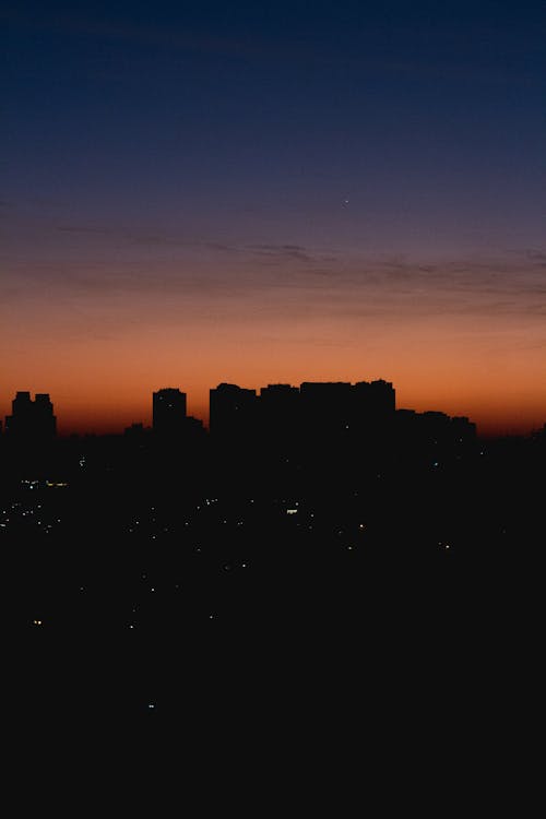 Silhouette of Buildings during Sunset