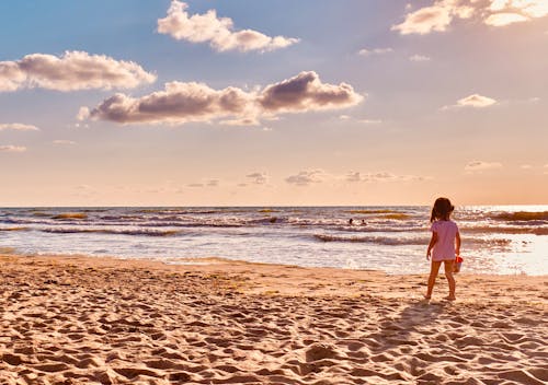 Girl Standing on the Beach