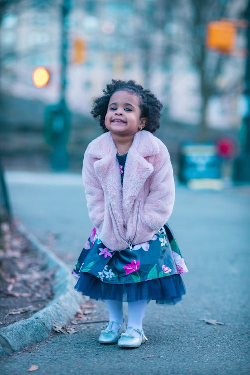 Little Girl Wearing a Pink Jacket