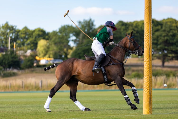 A Woman Playing Polo