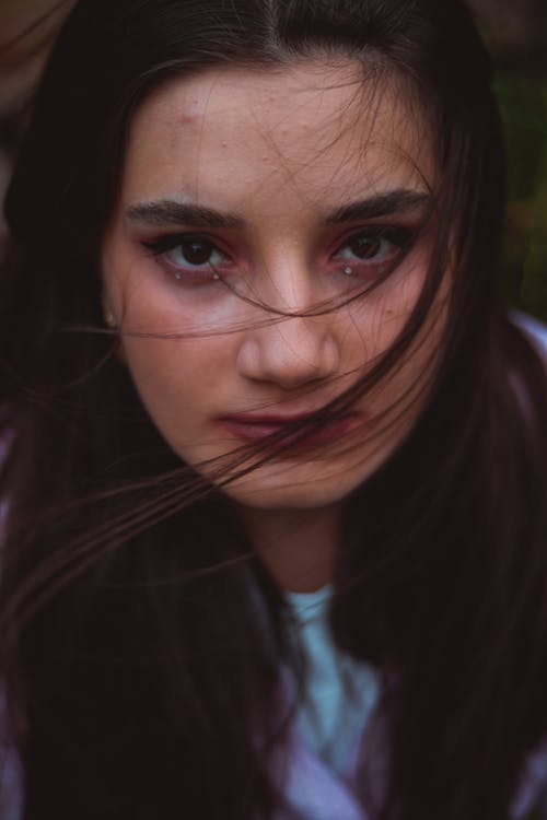 Woman's Face in Close Up Photography