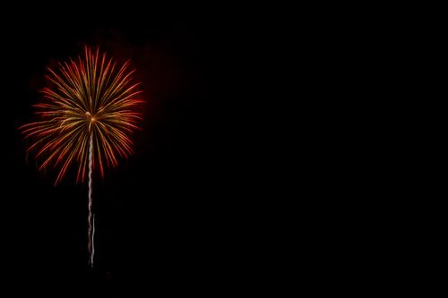 Free A vivid fireworks display captured against a clear night sky with ample copy space. Stock Photo