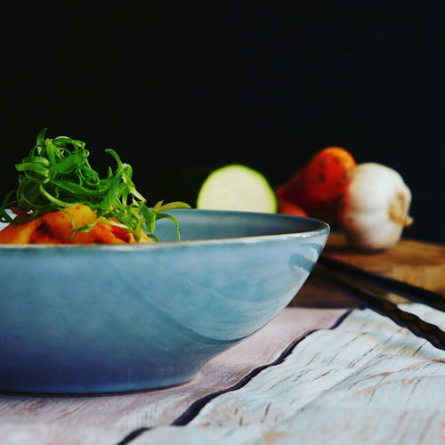 Food on Blue Ceramic Bowl