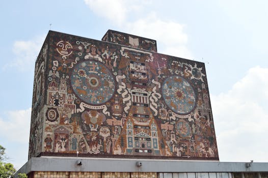 Vibrant mural on the exterior of the UNAM Central Library in Mexico City.