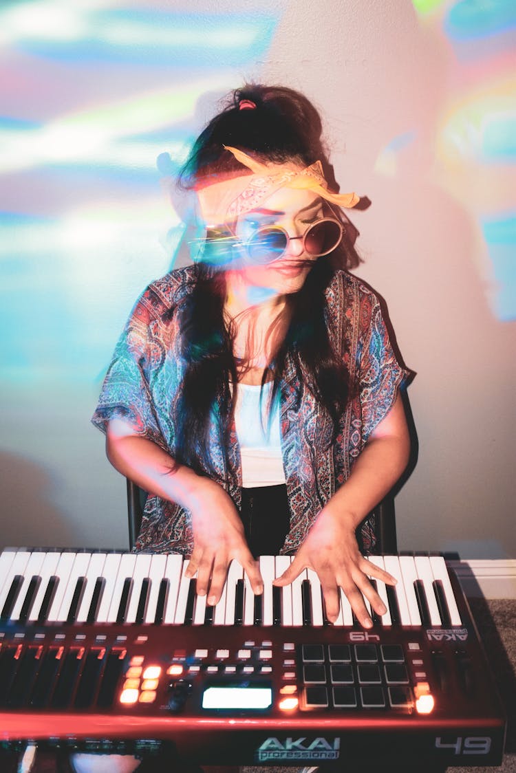 Woman Playing Disco Music On Keyboard 