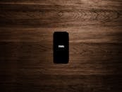 Turned on Black Iphone 7 Displaying Hello