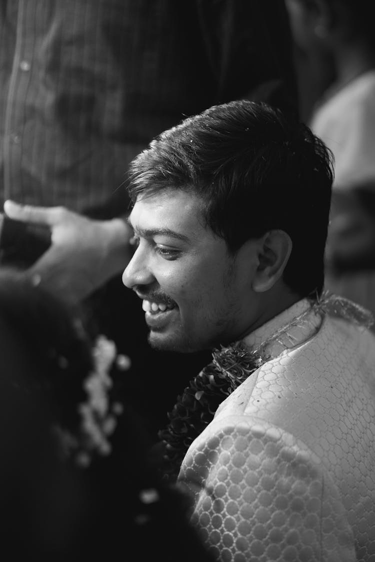 Face Of Smiling Man In Black And White