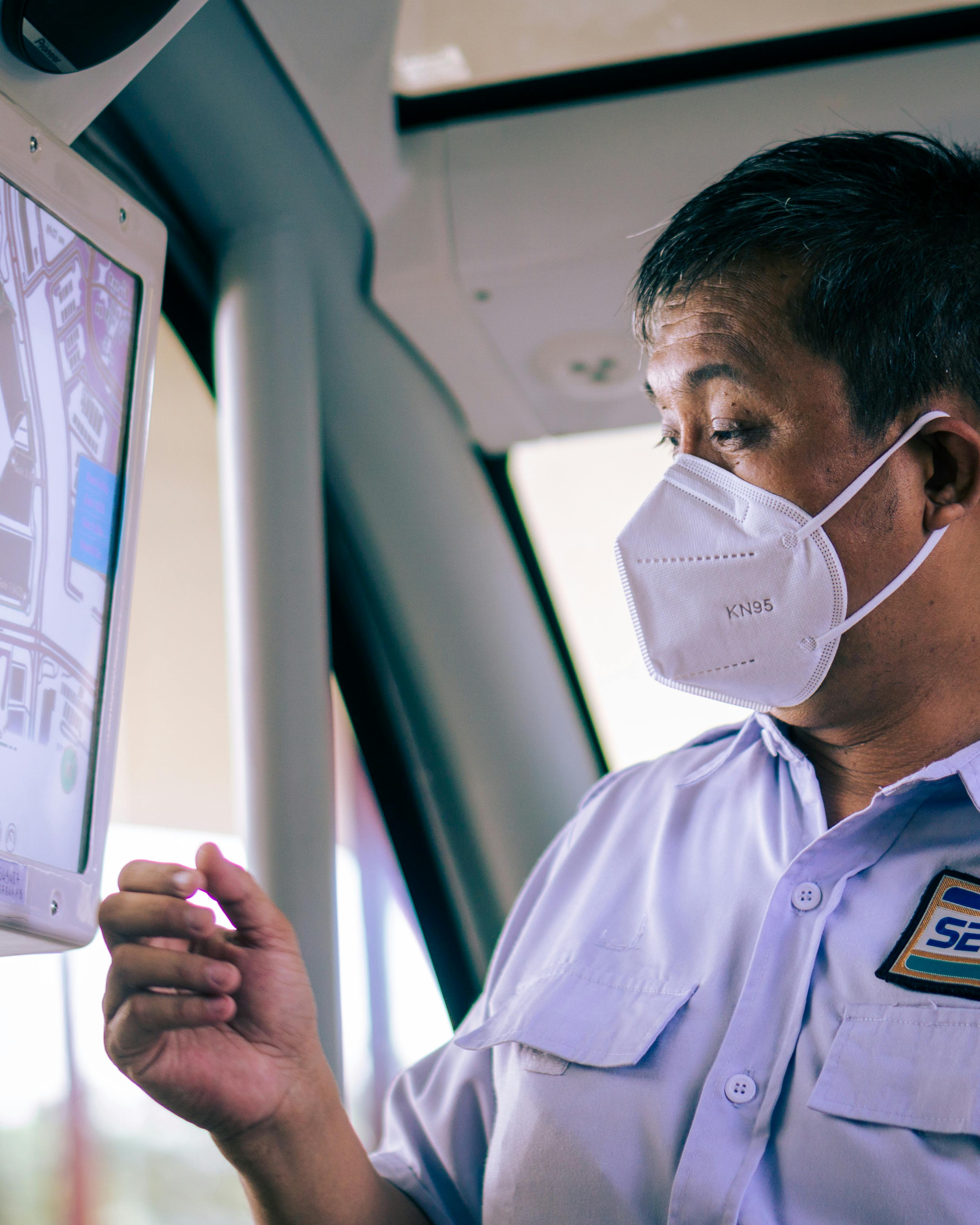 Photo of a Person with a White Mask · Free Stock Photo