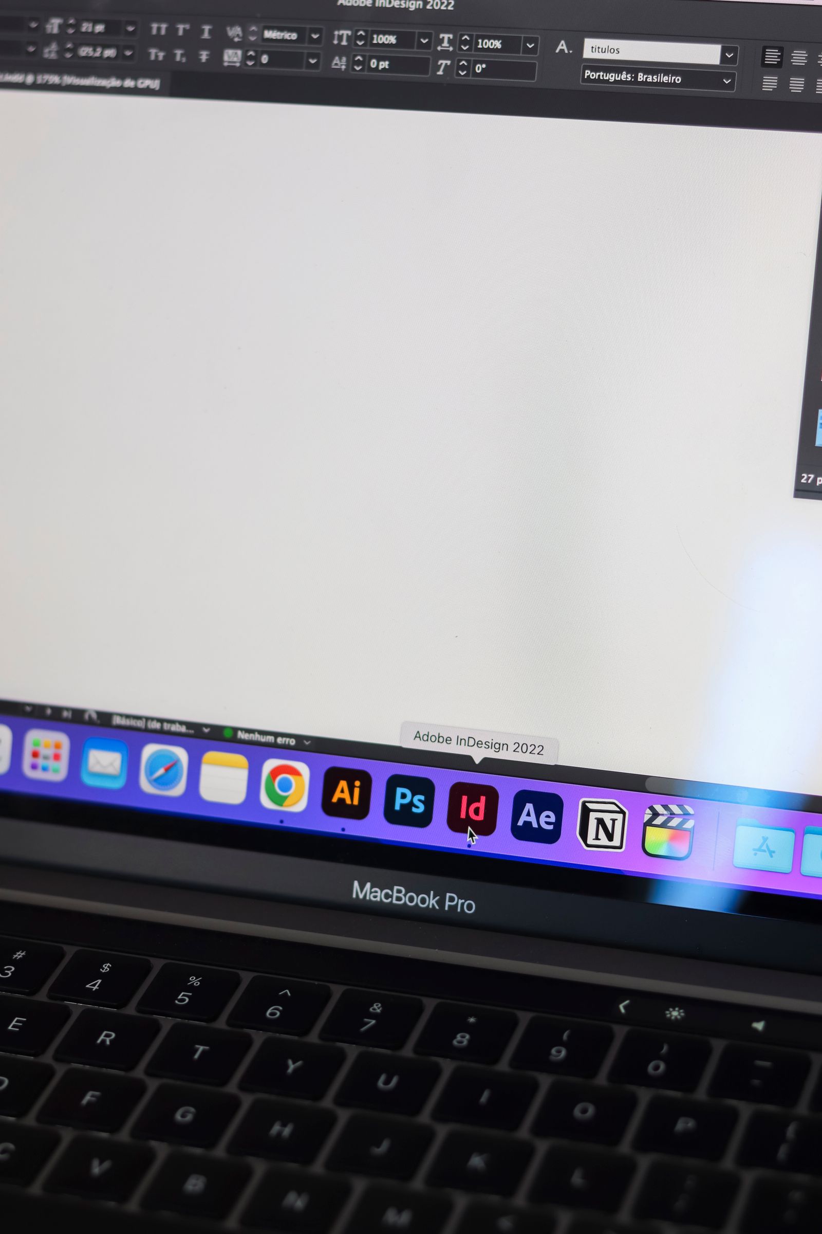 MacBook Pro displaying visual UI design tools and layouts