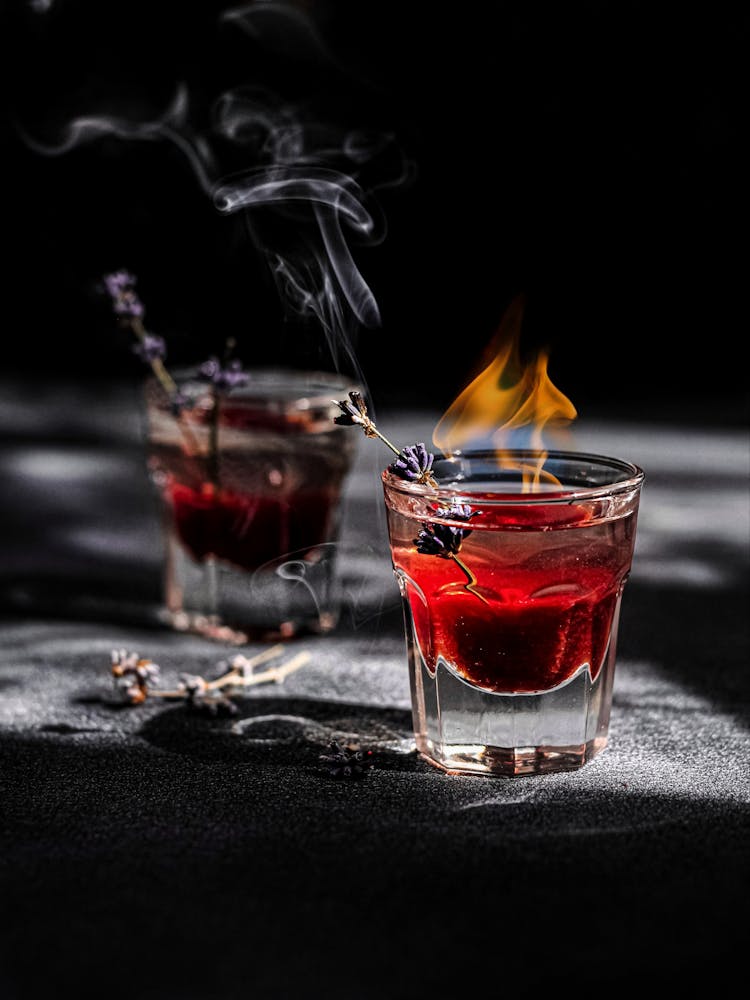 Flames On Top Of Glass With Alcoholic Drink