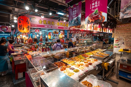 Colorful indoor Asian market with customers exploring diverse food options. Authentic and lively atmosphere.