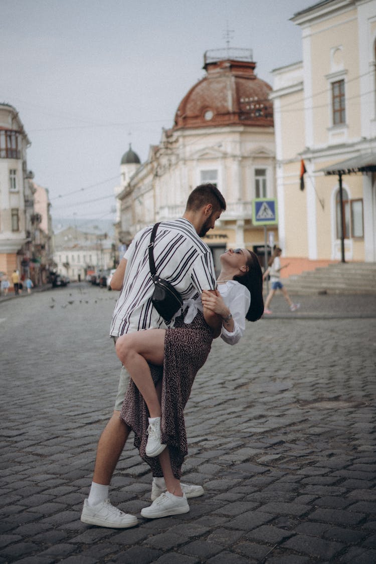 Couple Dancing On Street