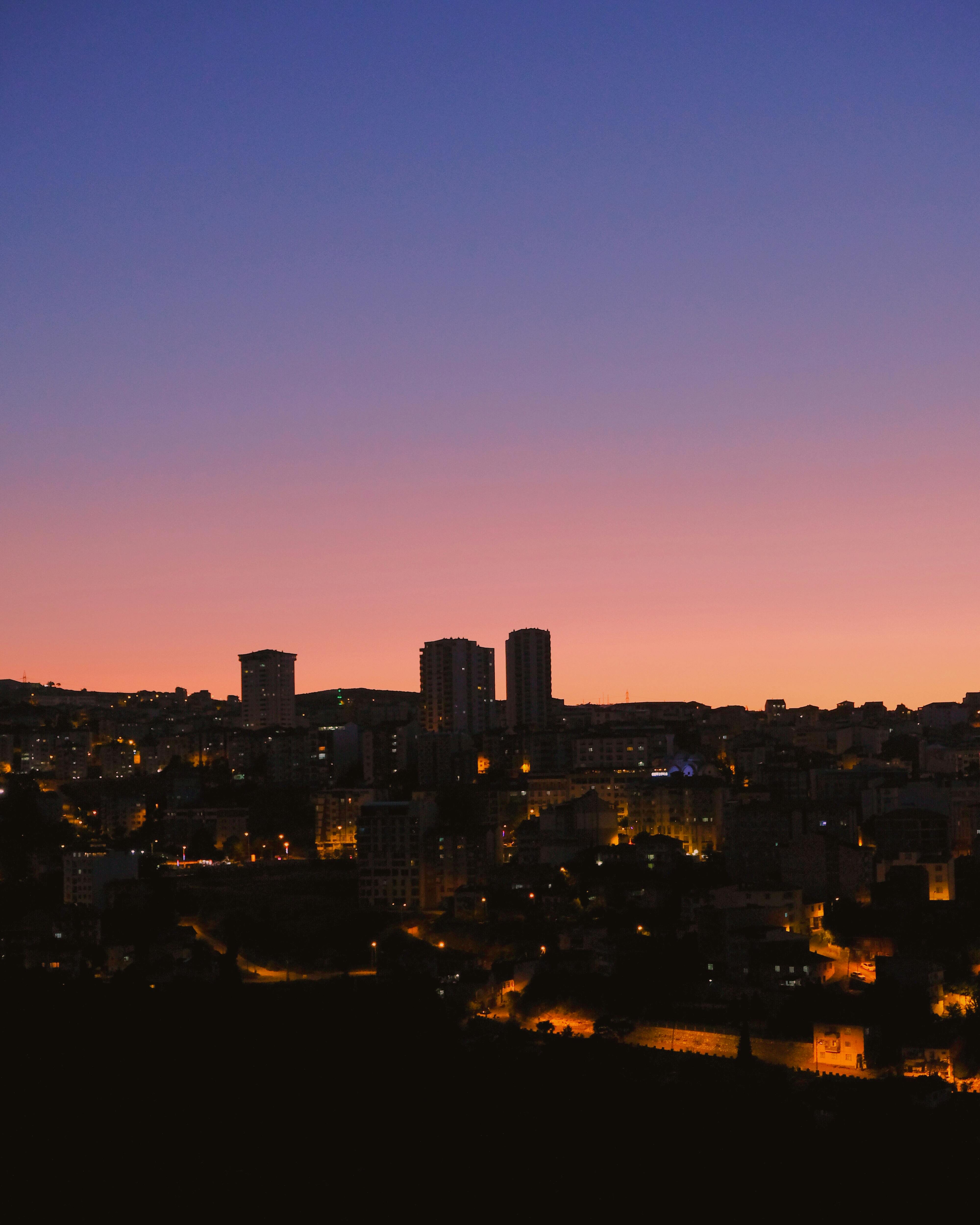 clear sky over city at sunset