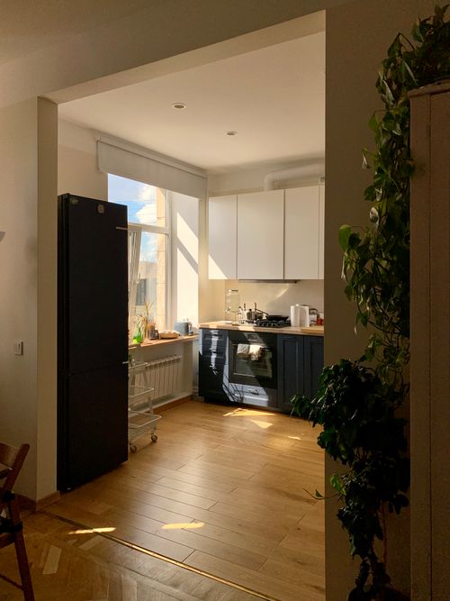 Free Bright kitchen interior with modern appliances and natural light. Stock Photo