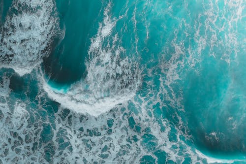 Scenic View of a Turquoise Sea and Waves 