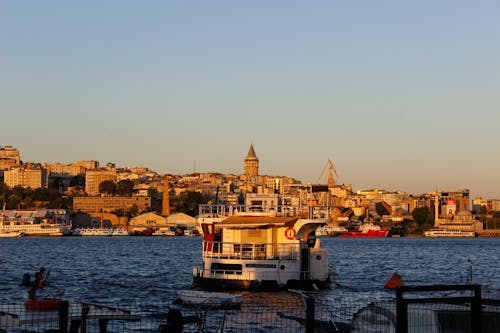 Town Waterfront and Boats on a River