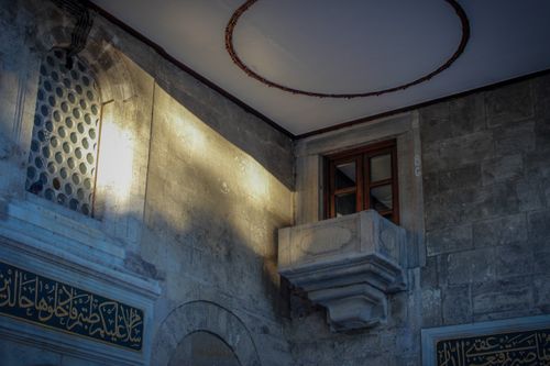 Free Close-up of Arabic architectural details featuring a stone balcony and window. Stock Photo