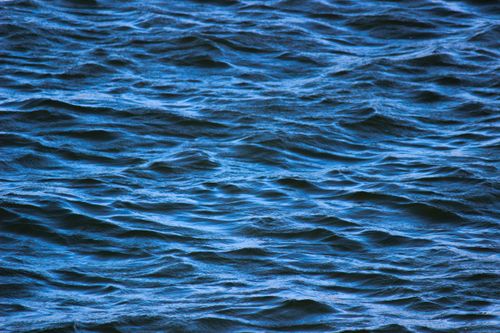 Free Capture of tranquil ocean waves under daylight, emphasizing calm and serenity. Stock Photo