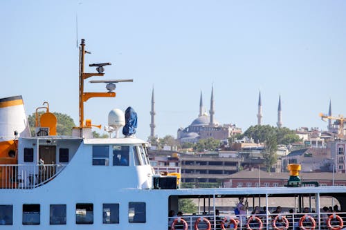 Closeup on a Ferry and Minarets in Background