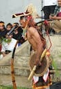 Man in Traditional Wear During a Festival