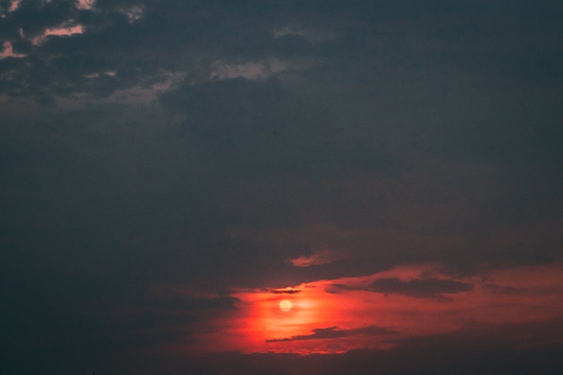 Red Sky Covered With Clouds