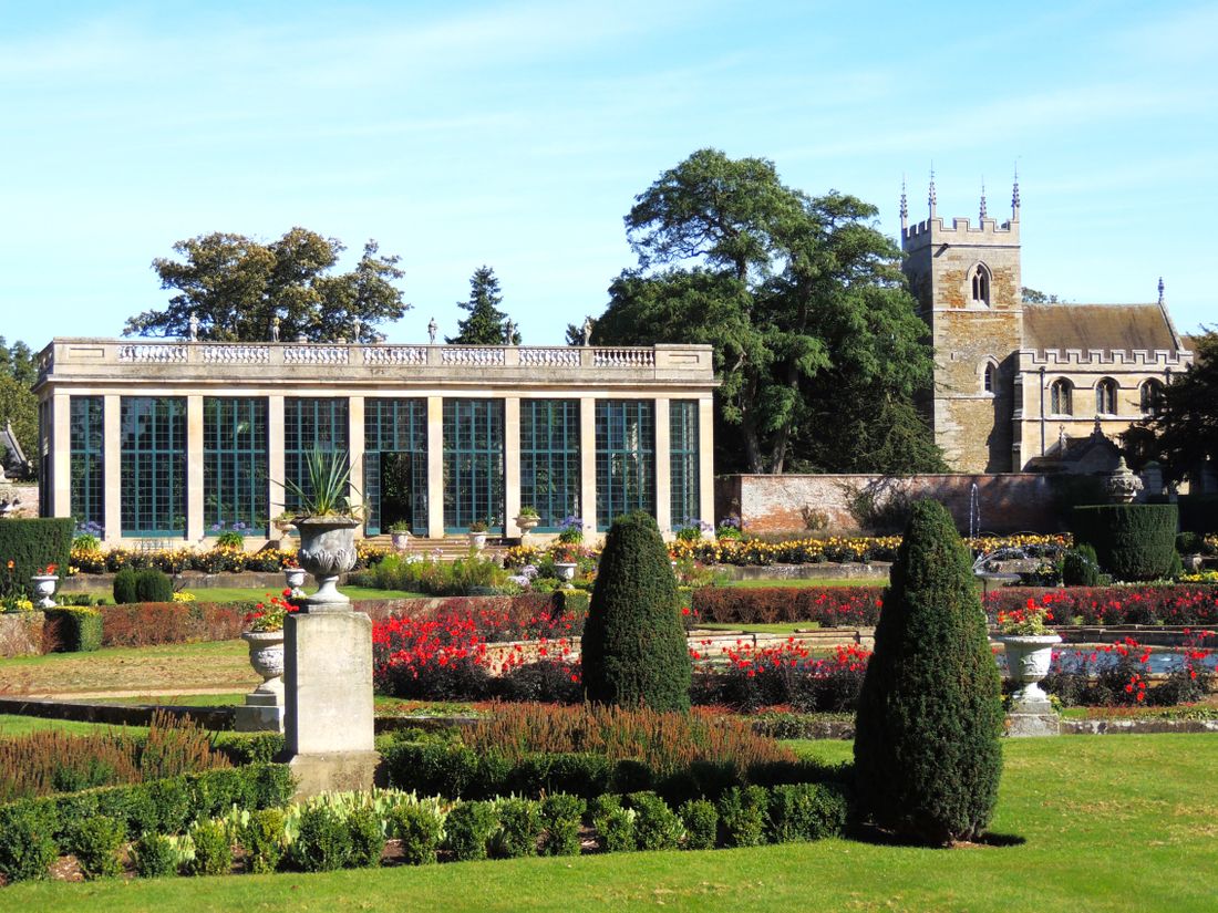 The neoclassical orangery and formal gardens at Belton House, Lincolnshire