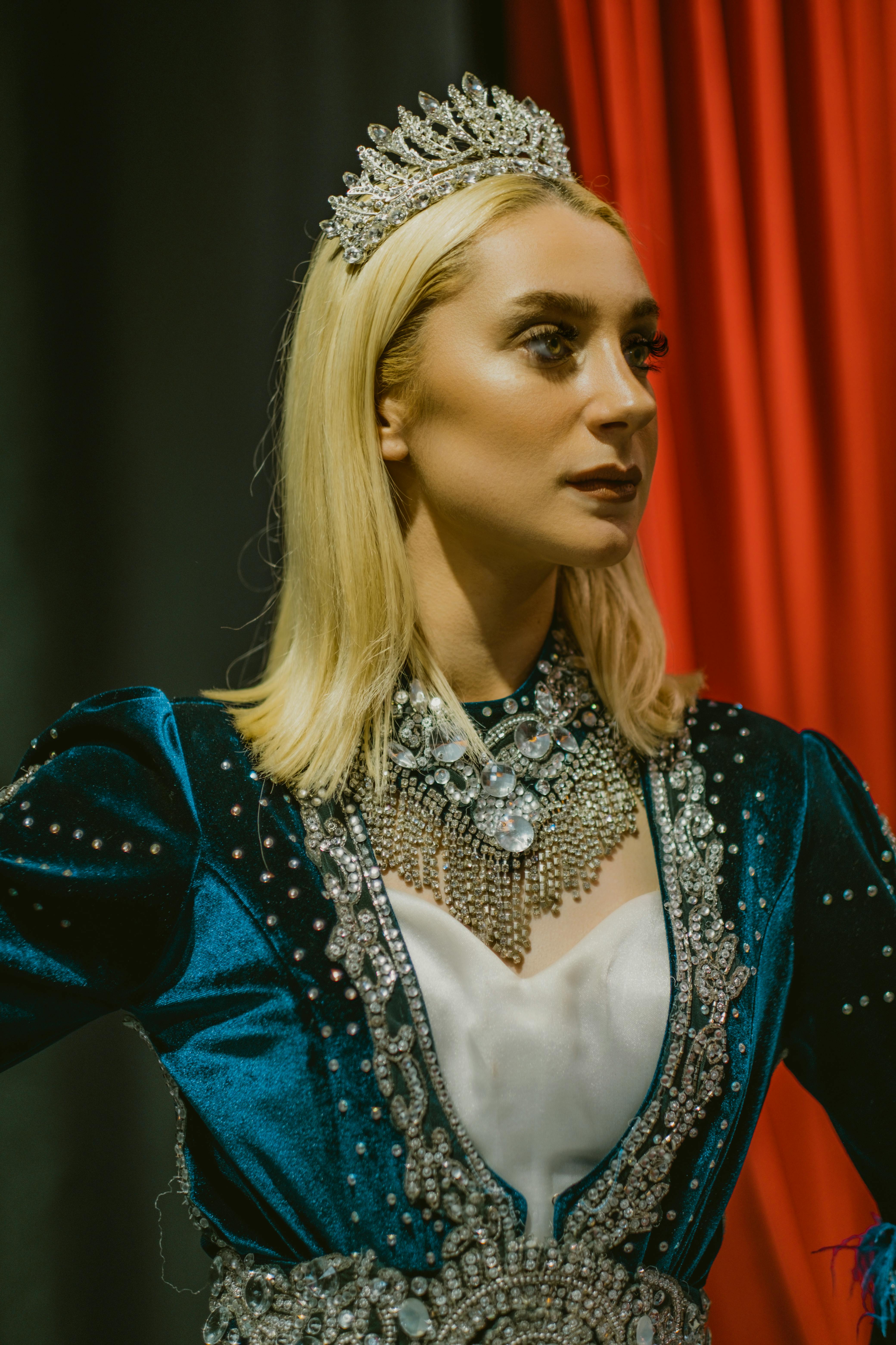 a beautiful princess wearing silver crown while looking afar
