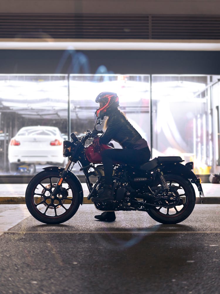 A Woman Riding A Motorcycle