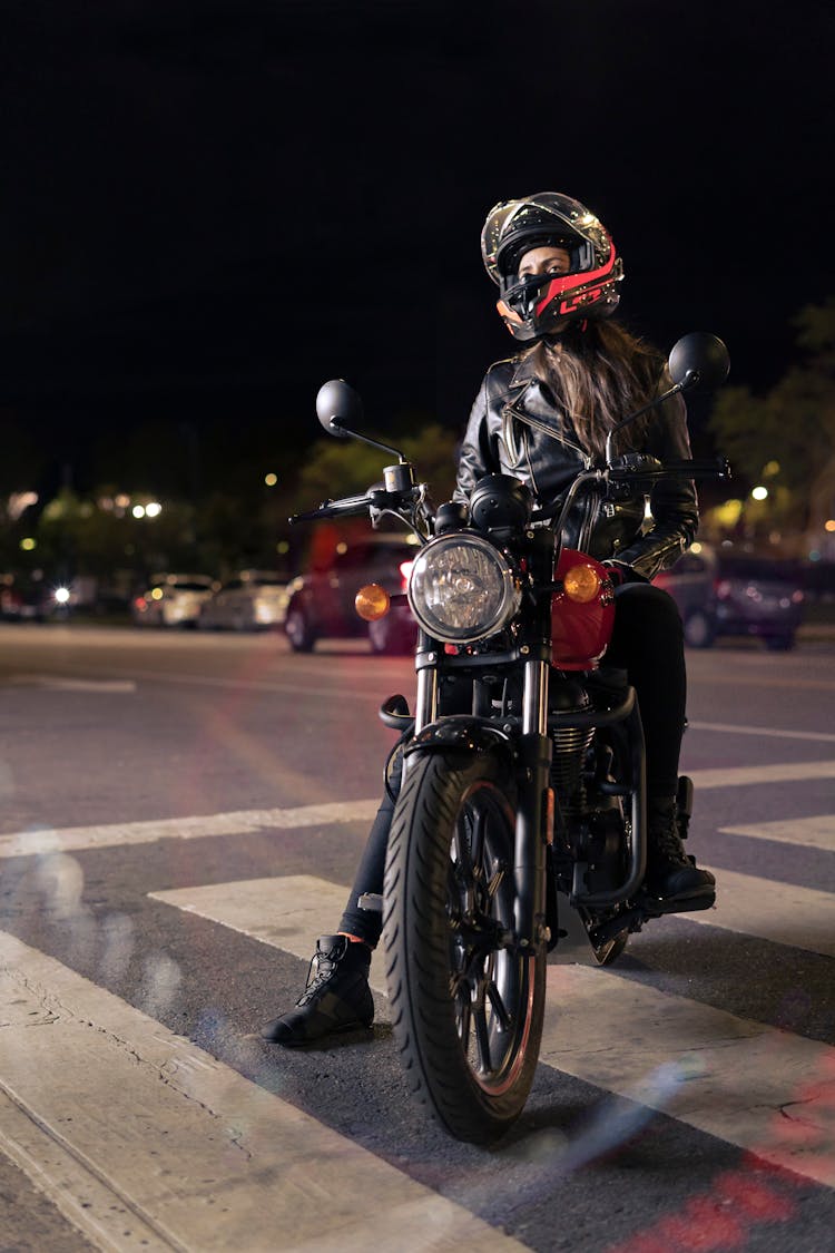 A Woman Riding A Motorcycle