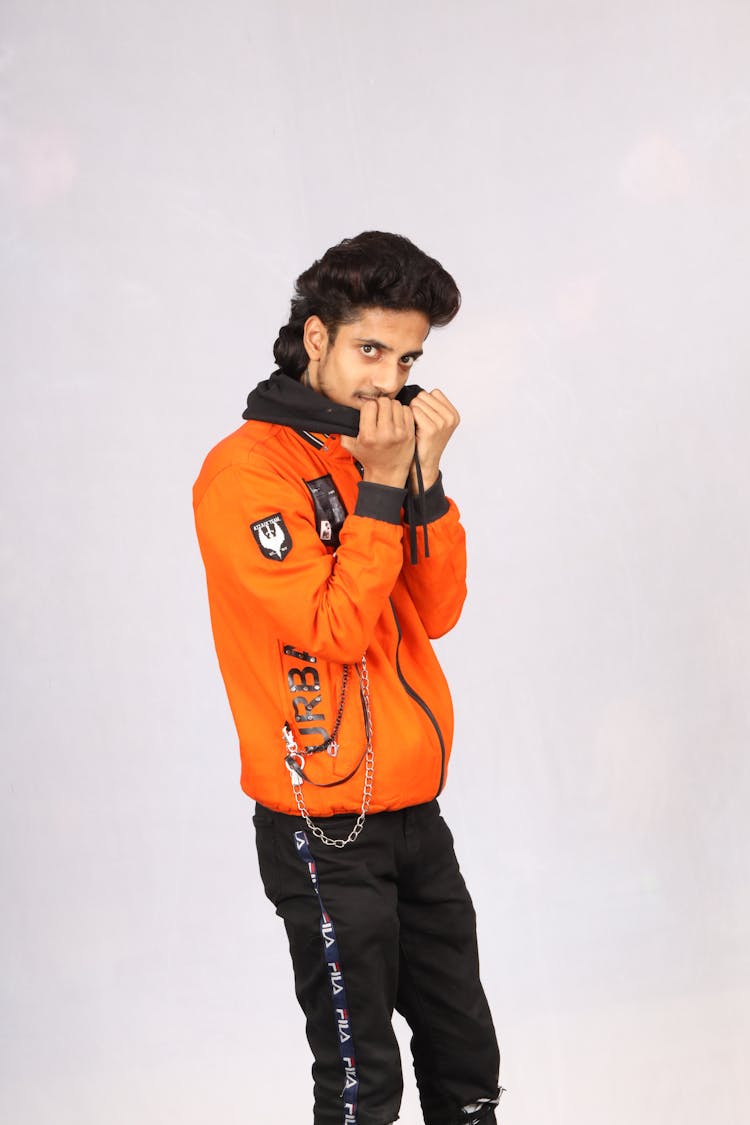 Man In Casual Clothes Posing In Studio