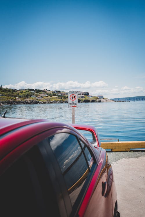 Car Parked by the No Parking Sign