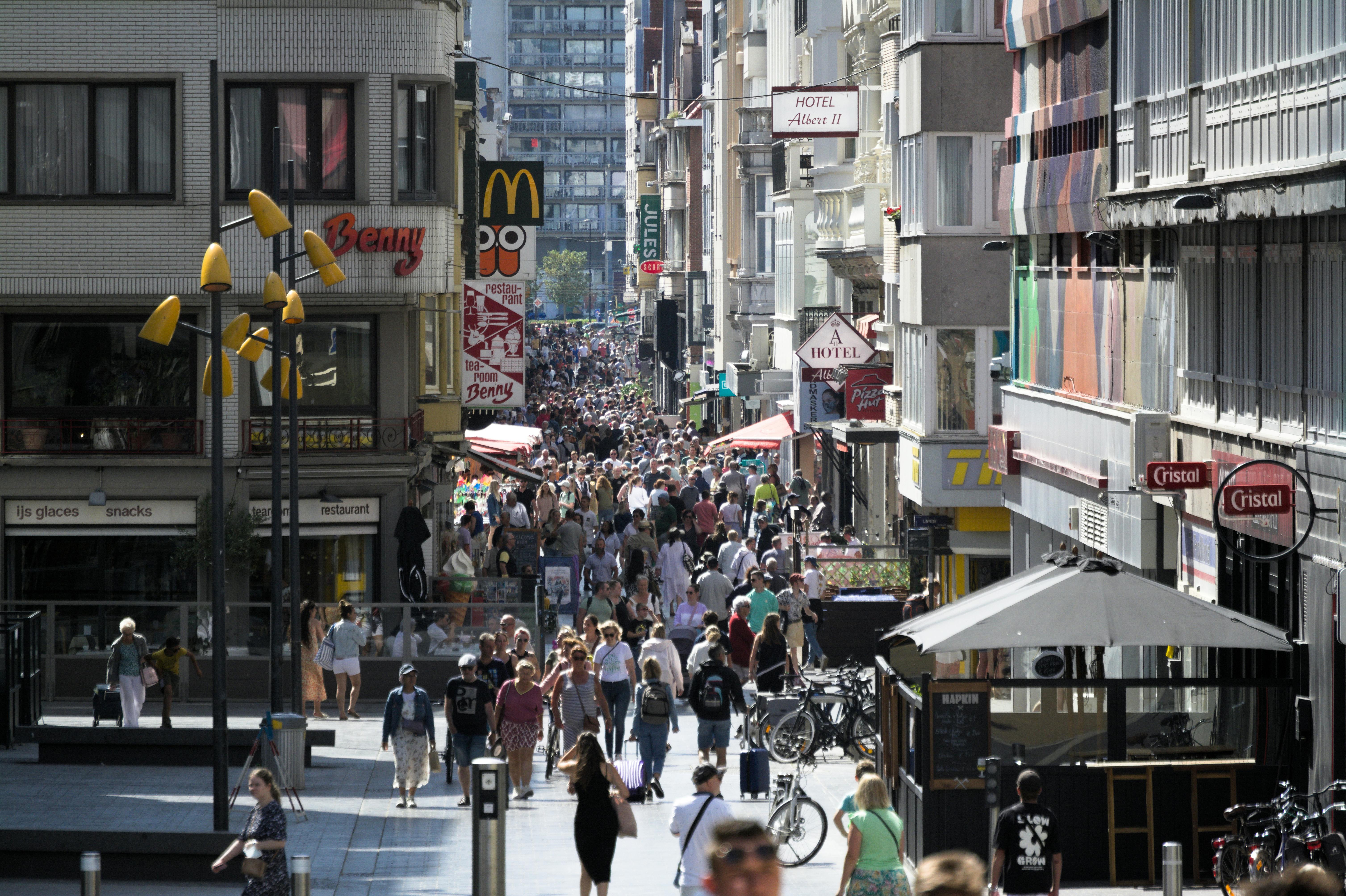 people walking on crowded street