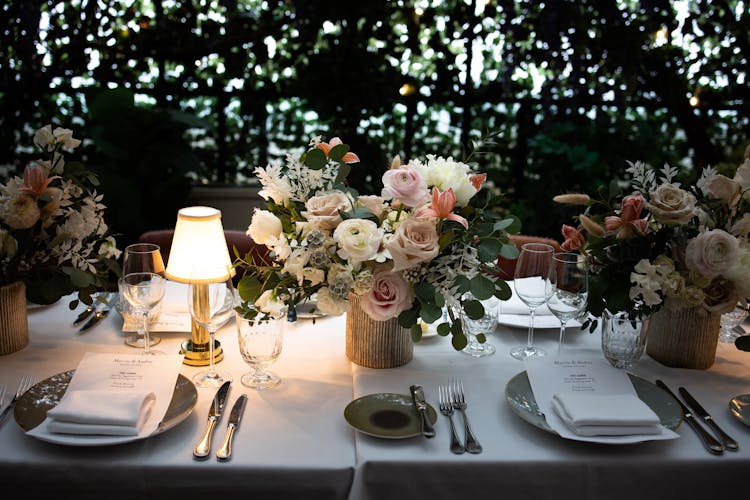 Menu Cards And Folded Table Napkins On Plates