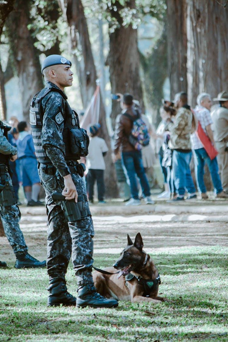 Soldier With A Dog At An Event 