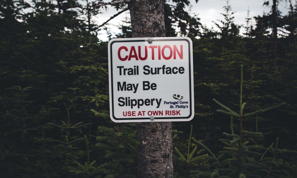 forest hiking trail warning sign ticks