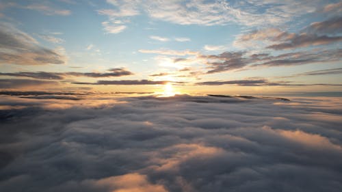 A View of a Sea of Clouds during the Golden Hour