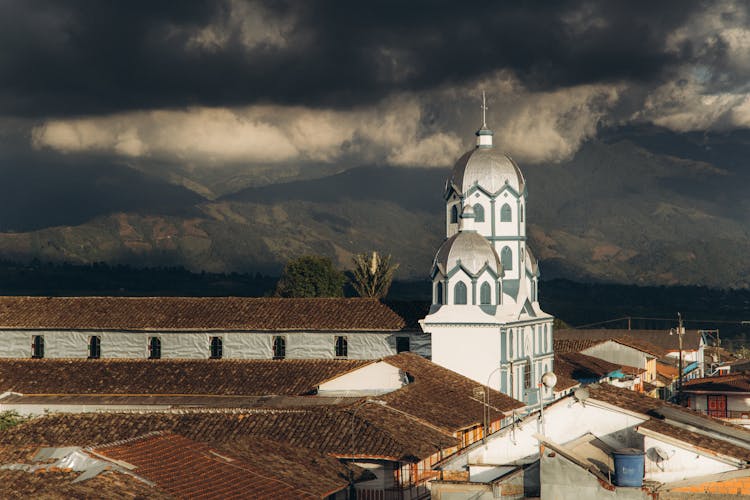 Dark Clouds Above Iglesia Maria Inmaculada In Filandia, Colombia