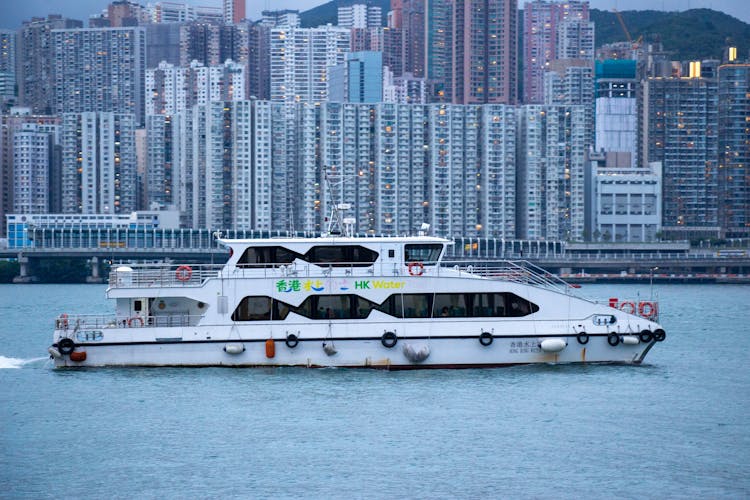 Ferry In Water Near Waterfront City