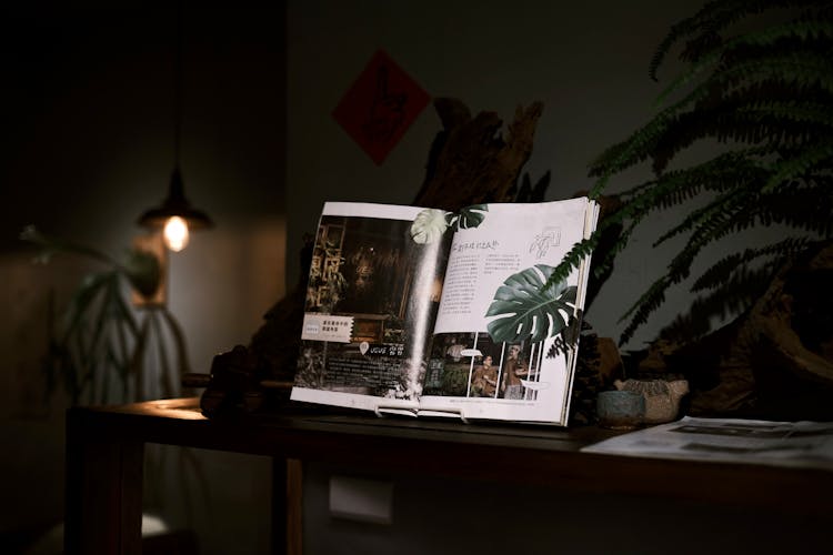 Magazine On Wooden Table