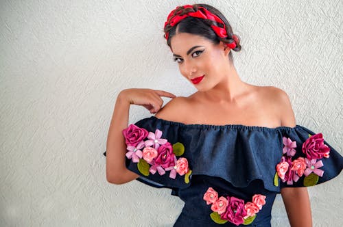 Beautiful Woman Wearing Floral Off Shoulder Blouse